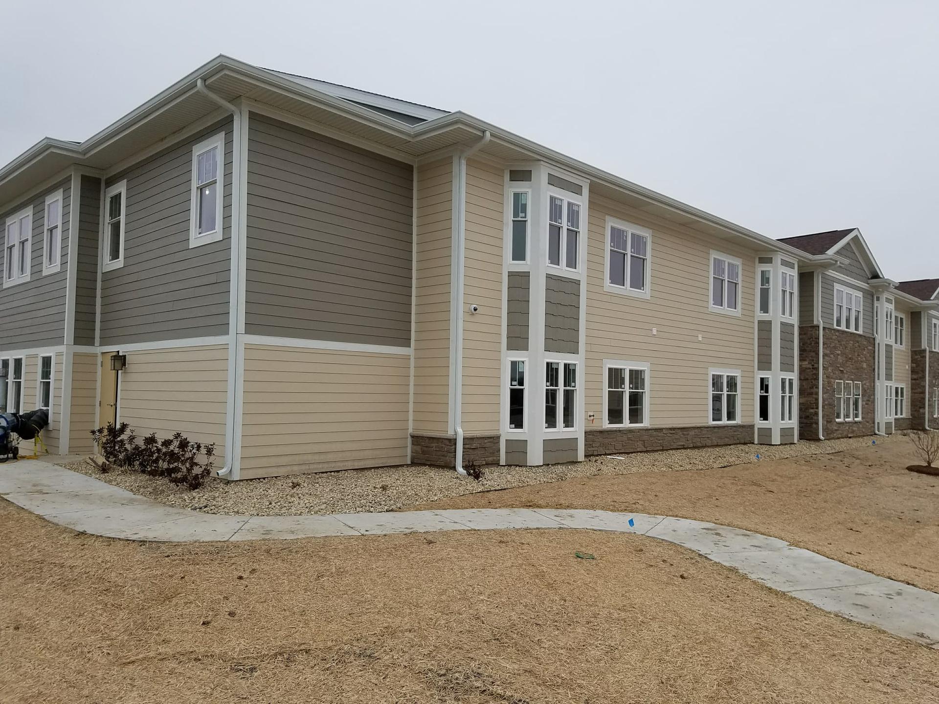 Multi-family apartment complex with completed siding