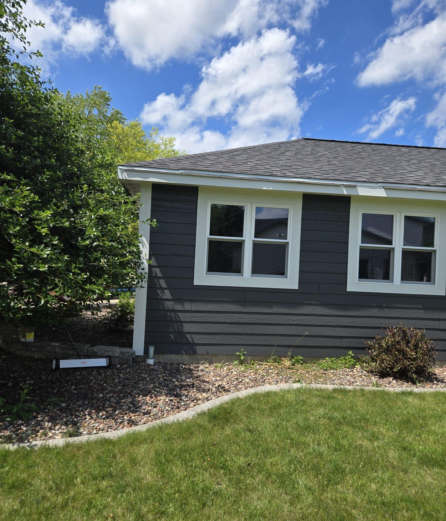 Residential siding installation completed